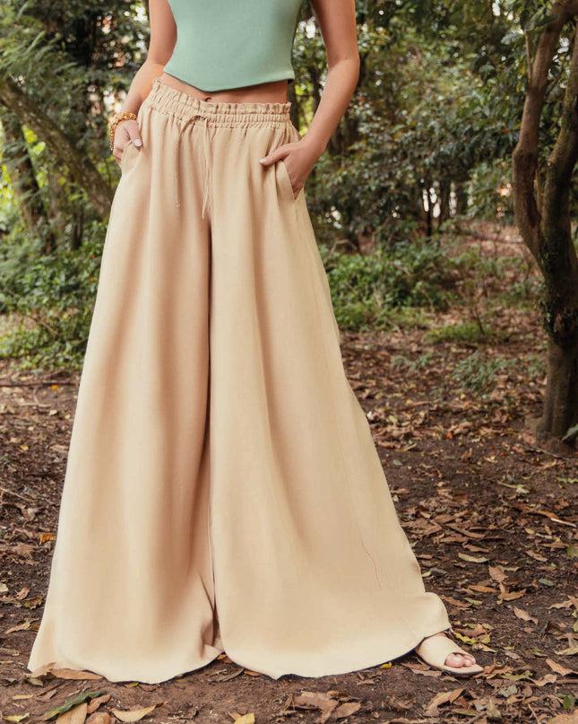 PANTALON TIRO ALTO CON BOLSILLOS DELANTTEROS FUNCIONALES PRETINA RESORTADA COLOR KAKHI